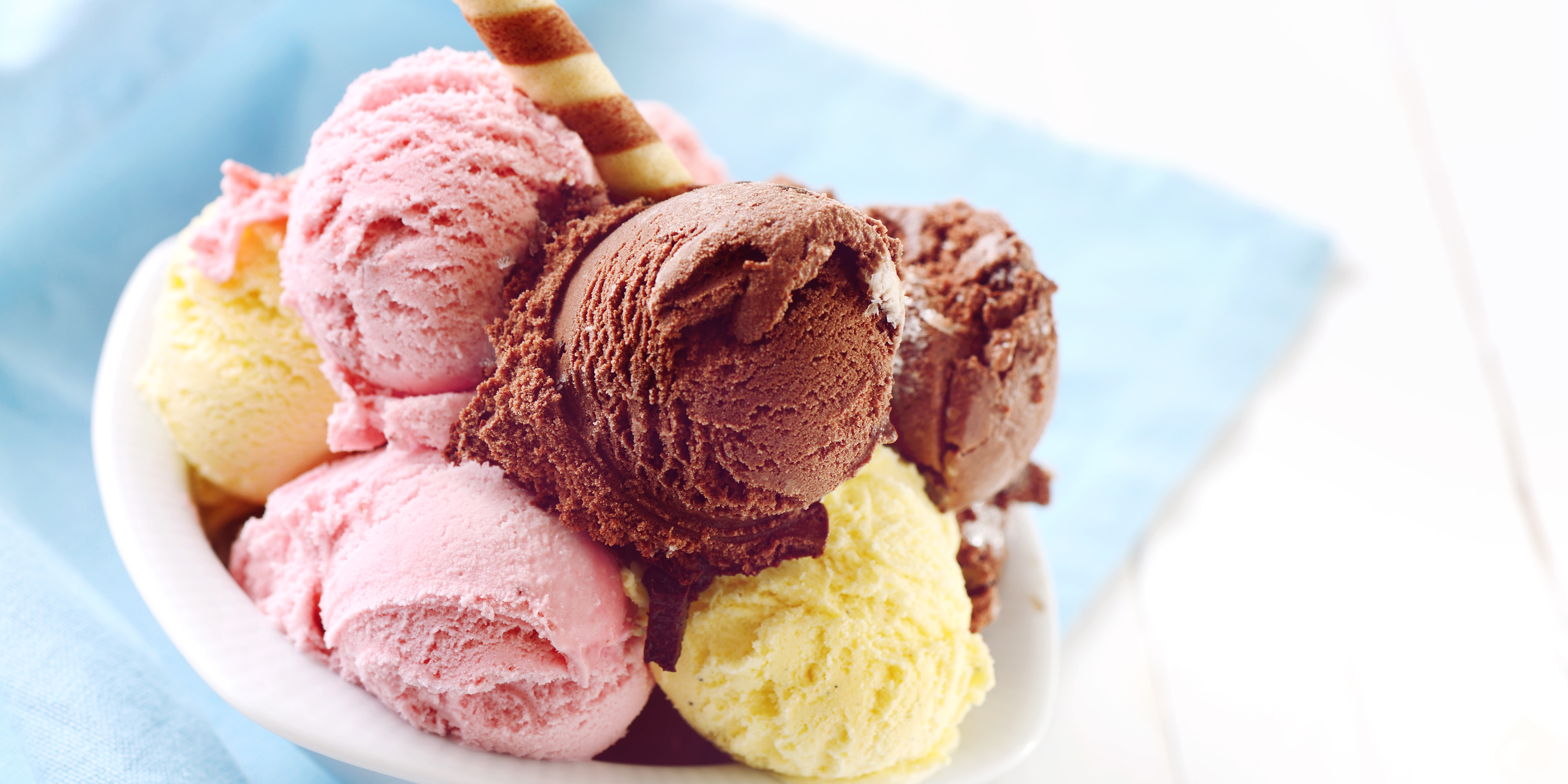 Various ice cream scoops in bowl